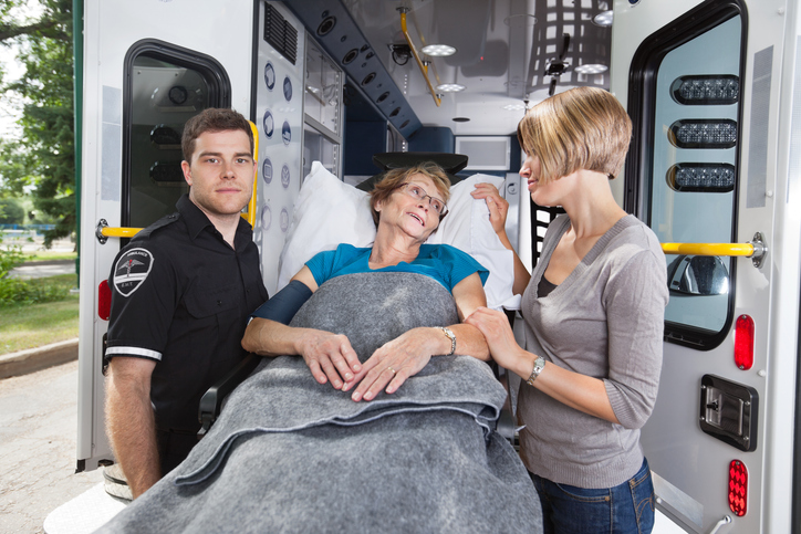 patinet and medical staff oiutside of lifesupport van